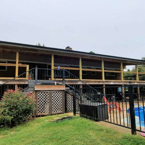 view of home's back porch and pool