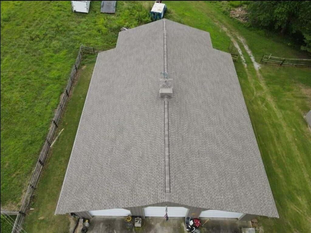 aerial view of commercial building with asphalt roof shingles